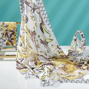 Luxurious baroque printed silk scarf and headband set, elegant gold scroll design for women.