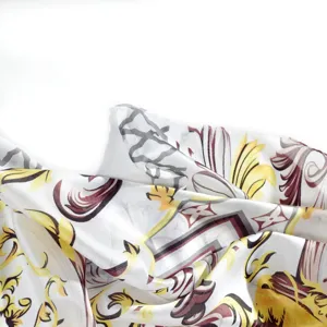 Luxury printed sun protection fabric detail, elegant grey and gold baroque silk style.