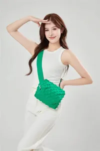 Green knitted crossbody bag for women, stylish casual shoulder bag with unique bubble texture.