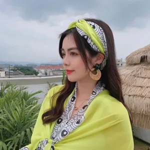 Trendy yellow printed silk hair band and matching scarf accessory for women, retro fashion style.