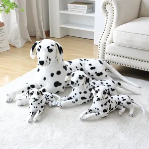 Detail view of cute simulation Dalmatian plush toy set arranged on white carpet indoor.