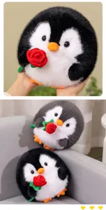 Close-up detail view of cute round penguin plush toy holding a red rose, soft fluffy texture.