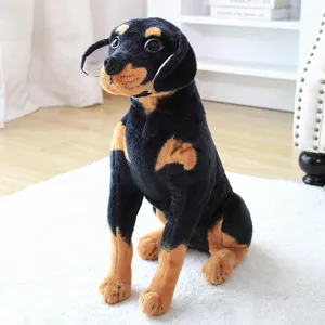 Realistic Rottweiler plush dog toy detailed view, cute stuffed animal doll for kids.