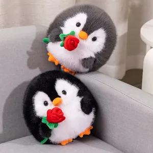 Cute round penguin plush toy holding red rose, soft stuffed animal doll for kids gift.