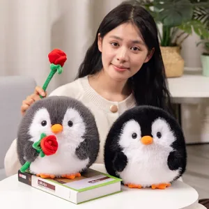 Cute round penguin plush toy holding red rose, soft stuffed animal gift for kids and girls.