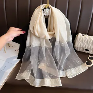 Beige sheer spliced scarf with delicate rhinestone and pearl flower details for elegant wear.
