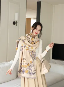 Detailed view of the women's cozy winter jacquard tassel scarf worn elegantly in a chic room.