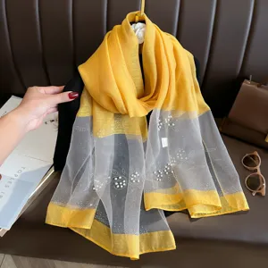 Sheer organza silk-blend scarf featuring delicate pearl embellishments and yellow border.