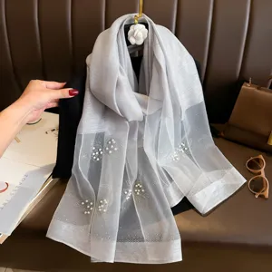 Elegant silver grey organza scarf with faux pearls and rhinestones, perfect for sun protection and travel.