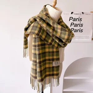 Cozy winter plaid scarf for women, vintage green and yellow check pattern with soft fringe details.