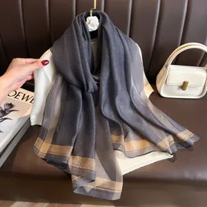 Elegant grey long silk scarf for women, versatile autumn and winter fashion shawl and wrap.