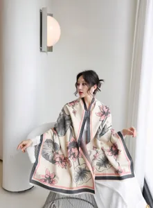 Detailed view of the winter warm thickened jacquard printed shawl scarf worn by model.