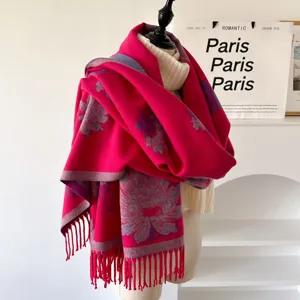 Close-up detail of women winter jacquard floral scarf, elegant fringe and cozy warm texture.