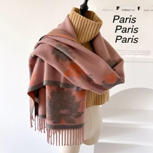 Detailed close-up view of women's floral jacquard thick warm winter scarf with fringes.