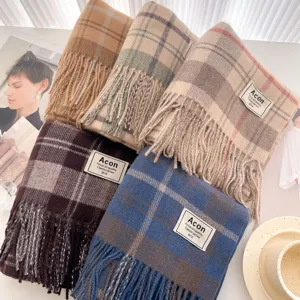 Winter warm plaid tassel scarf for women, trendy cozy colorblock long shawl accessory.