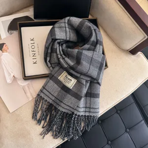 Cozy grey plaid winter tassel scarf for women, warm classic design fashion neck wrap.