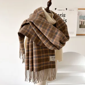 Women's autumn winter brown plaid scarf, cozy fringed neck wrap, warm student style fashion.