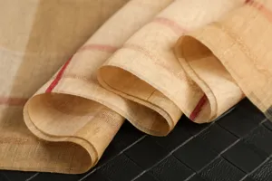 Elegant silk wool plaid scarf, premium beige cashmere feel wrap for women, chic accessory detail.