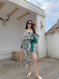 Tropical palm leaf print beach cover-up kimono cardigan with green belt for vacation.