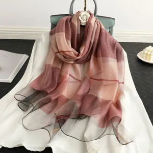 Elegant sheer plaid silk scarf for women, lightweight shawl wrap with subtle metallic threads.