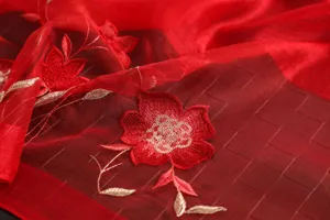 Red sheer scarf detail with elegant floral embroidery and sequins for women fashion wrap.