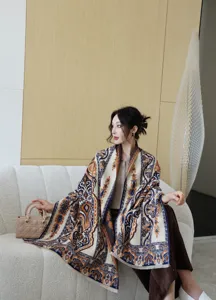 Detailed view of women's autumn winter printed cashmere feel shawl scarf, elegant vintage design.