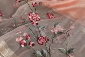 Handcrafted beaded silk scarf detail, elegant floral rose embroidery and gold border trim.