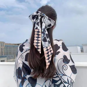 Lightweight printed floral hair bow and matching shawl set for women, stylish summer fashion.