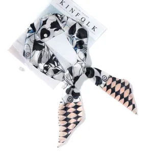 Chic printed silk twilly scarf for women, lightweight neck ribbon and stylish hair accessory.