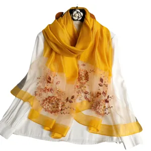 Mulberry silk embroidered long scarf with elegant floral design, perfect spring fashion accessory.