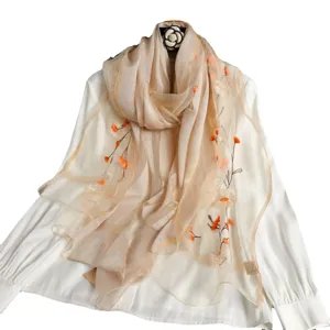 Elegant silk embroidered scarf featuring delicate floral patterns, perfect for versatile daily wear.