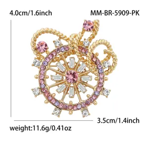 Detailed rhinestone ship wheel brooch, alloy gold-tone metal with pink and purple crystal stones.