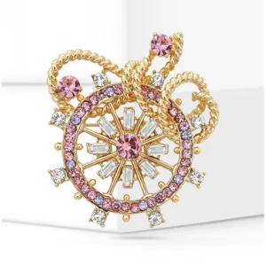 Gold alloy rhinestone ship wheel brooch detail, sparkling pink crystal decorative pin for clothes.