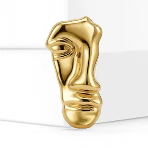 Gouden roestvrijstalen abstracte gezichtsbroche, moderne surrealistische design lapelpin.