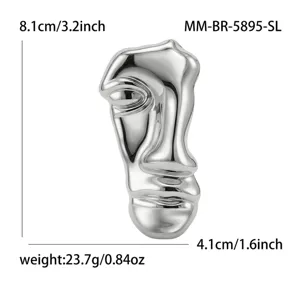 Minimalistisch roestvrij staal half gezicht masker broche voor stijlvolle accessoires.
