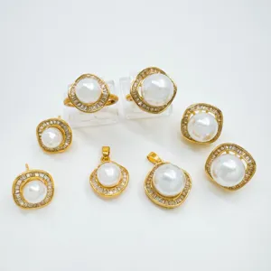 Chic geometric pearl jewelry accessories set with gold finish and sparkling zirconia.