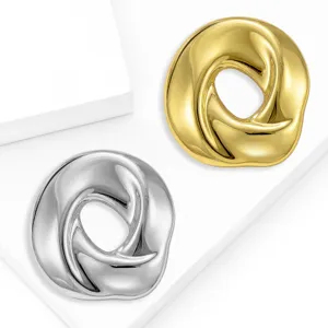 Close up detail view of stylish gold and silver twisted round brooches on clean white display.