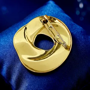 Gold irregular round brooch back detail, stainless steel metal clasp accessory for clothes.