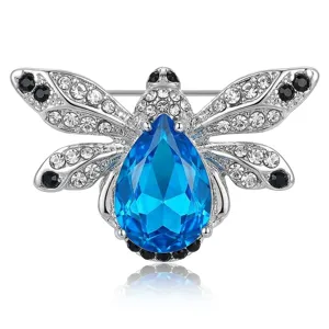 Elegant silver-tone bee brooch featuring sparkling rhinestones and a striking blue teardrop crystal.