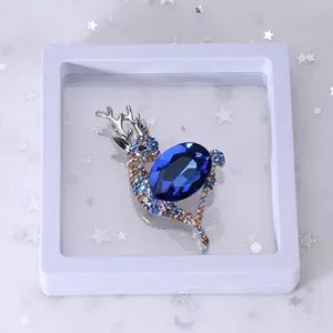 Exquisite crystal deer brooch in floating frame, elegant blue rhinestone jewelry gift.