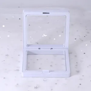White PE film floating jewelry display box detail view showing transparent clear design.
