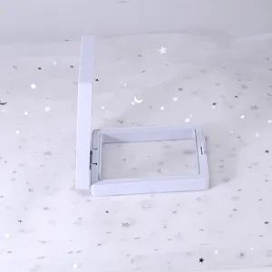 Detailed view of a white floating display box for jewelry, coins, and small collectibles.