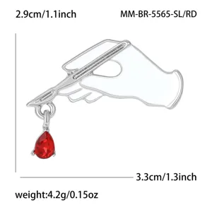 Creative alloy enamel scalpel brooch with red crystal teardrop pendant for fashion wear