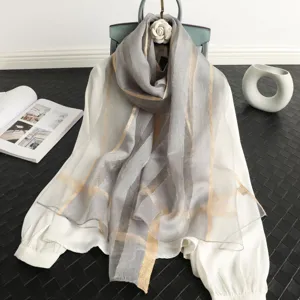 Autumn winter silk wool blend scarf with elegant gold stripes versatile fashion accessory.