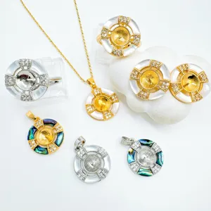 Detailed shot of fashion geometric mother of pearl jewelry set featuring rings and pendants.