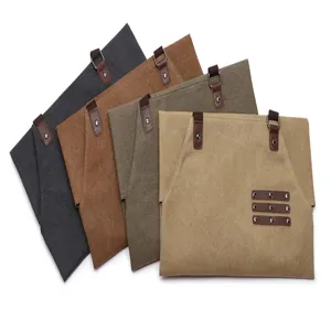 Canvas multifunctioneel werk schort met lederen bandjes en metalen knopen voor tuinmannen.