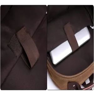Canvas backpack interior detail showing padded laptop compartment and secure velcro strap.
