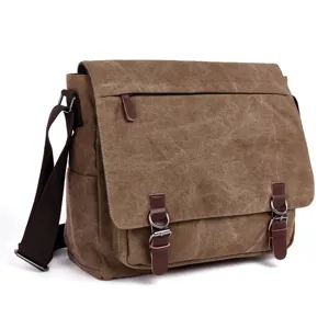 Mens casual canvas messenger bag with brown leather buckle flap and adjustable shoulder strap