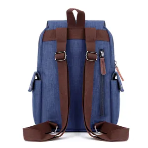 Waterproof canvas casual backpack travel rucksack for daily outdoor use and school.