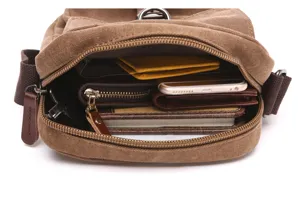 Detail close-up shot showing internal storage capacity of casual canvas shoulder bag